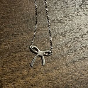 Tiffany and Co. 925 sterling silver. Bow pendant. Preowned. For women. 16in